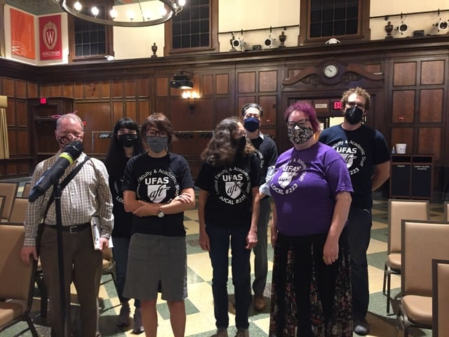 Members at the mic at a town hall